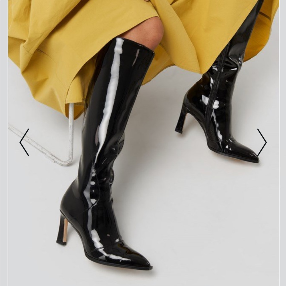 Glossy patent knee-high boots.
